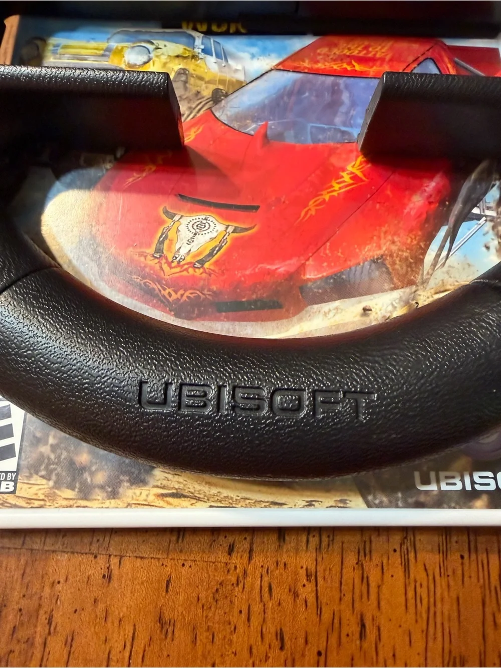 Wii Monster 4x4: World‎ Circuit (Wii) - Black Ubisoft Steering Wheel Included